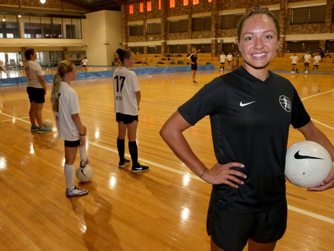 Matildas' star Kyah Simon shows the children some futsal skills.