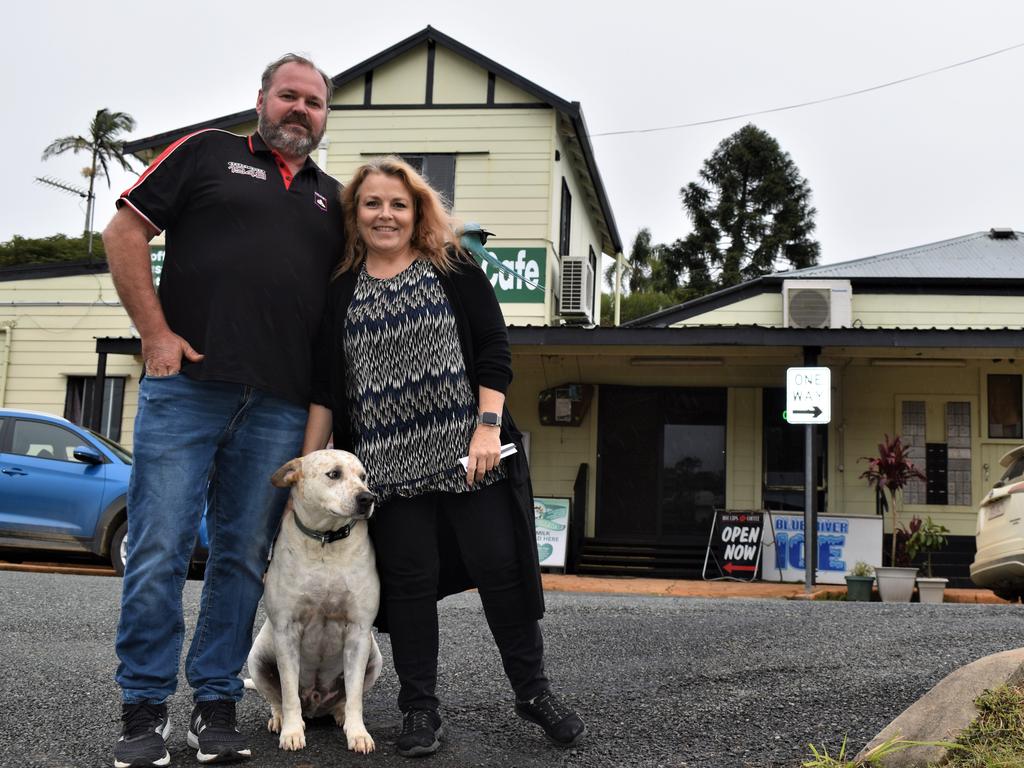 Eungella General Store owners Jamie Mussig and Michaela Pritchard with their shop pets, Tully the dog and Sammy aka Chookie the ringneck parrot, wanted to thank the community for all of their support. Picture: Heidi Petith