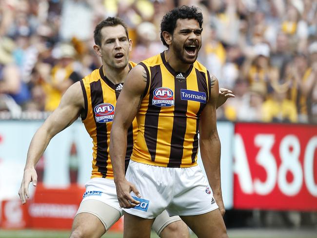 Cyril Rioli and Luke Hodge during the 2015 AFL Grand Final. Picture: David Caird