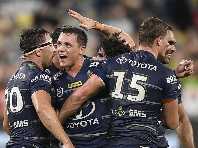 The Cowboys celebrate after winning the round seven NRL match between the North Queensland Cowboys and the Canberra Raiders at QCB Stadium, on April 24, 2021, in Townsville, Australia. (Photo by Ian Hitchcock/Getty Images)