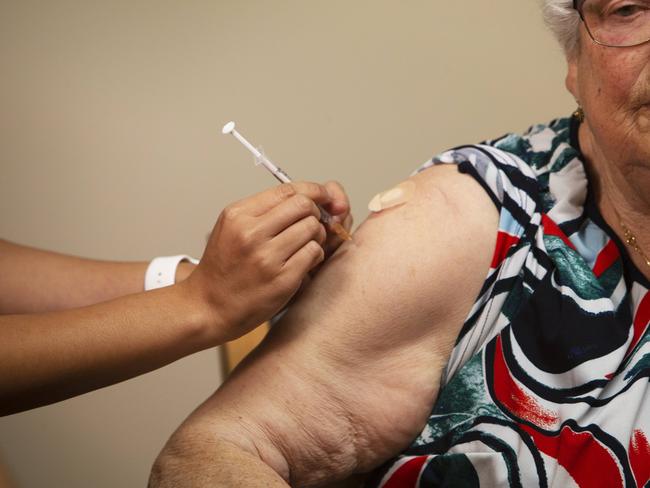 ADELAIDE, AUSTRALIA - Advertiser Photos FEBRUARY 23, 2021: Rembrandt Aged Care resident Margje Ketellapper 90yrs receives the Pfizer Vaccine for COVID-19 from Immunisation Nurse Lynn Phan in the age care facility at Oaklands Park, SA. Picture: Emma Brasier