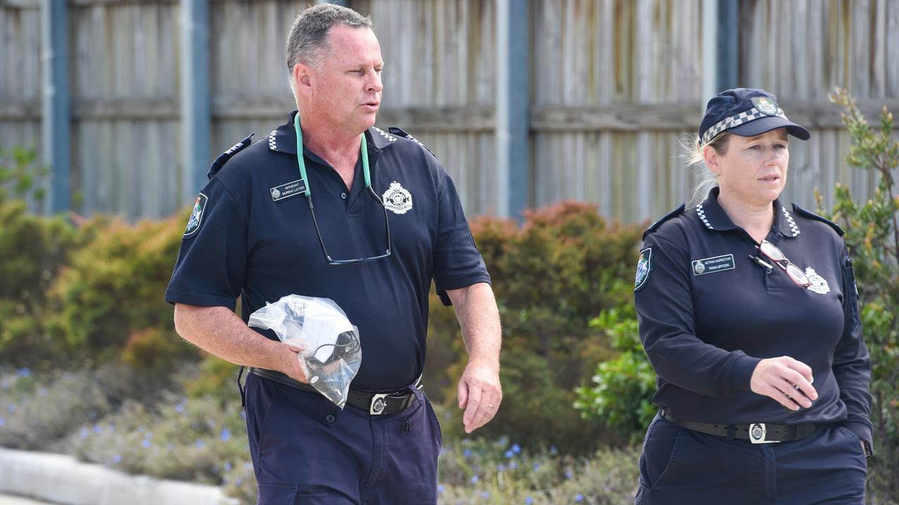 Police leave Bowen station.