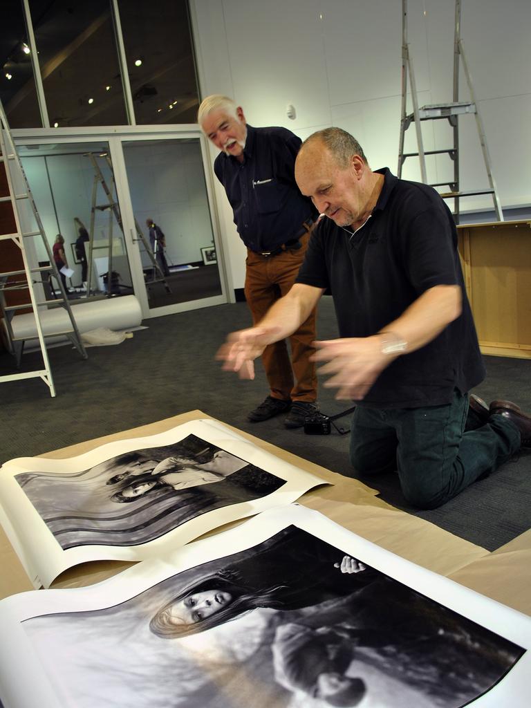 Graham Burstow (left) and John Elliott at the Icons exhibition in Brisbane. Picture: Contributed.