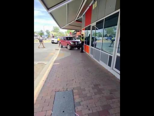 Police on scene after car crashes into NT politician's office