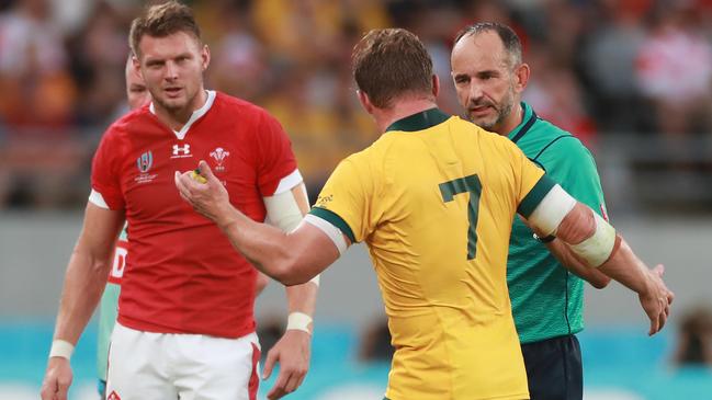 Michael Hooper chats to the referee after a tackle. Picture: Getty Images