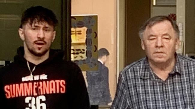 Christopher (left) left Sutherland Local Court supported by his father Bill Saravinovski (right) on Wednesday. Picture: Elizabeth Pike