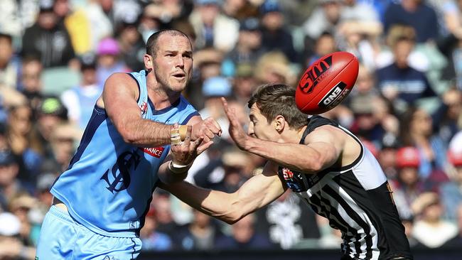 Zane Kirkwood gets a handpass out during last year’s grand final. Picture Sarah Reed