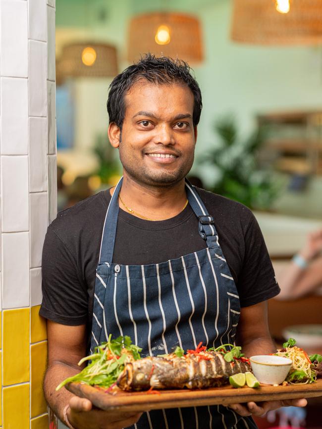 Barra is Australia's second most Instagramable food. Chef Santosh Kumar Shah knocks up barramundi spread at Snapper Rocks, Waterfront, Darwin. Picture: Che Chorley