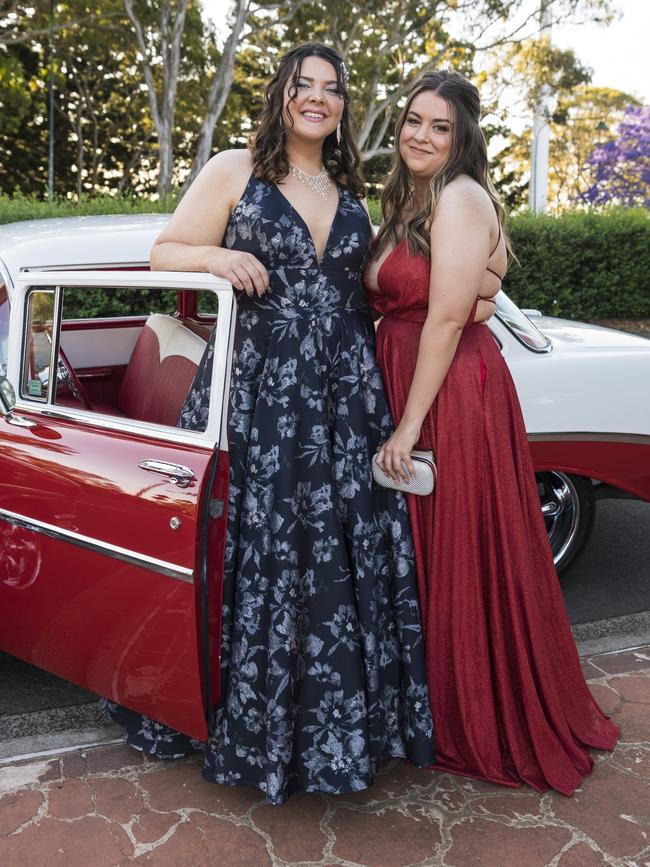 Danielle Woodcock (left) and Hannah Sheridan at Centenary Heights State High School formal at Picnic Point, Friday, November 20, 2020. Picture: Kevin Farmer