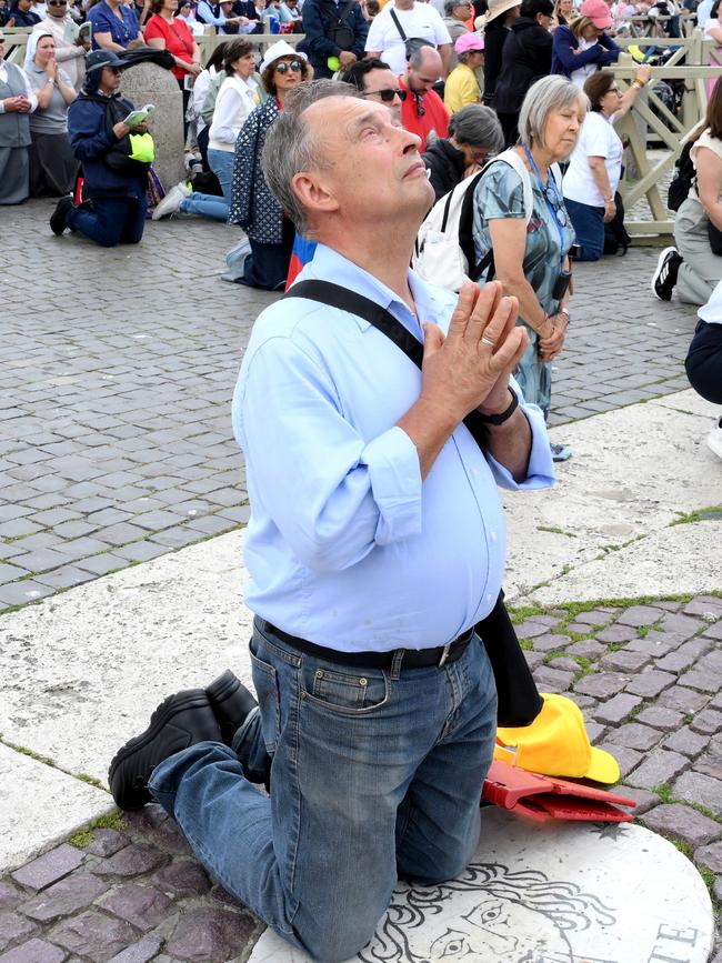 Well wishers pray during the Inauguration Mass of Pope Leo XIV. Picture: Getty