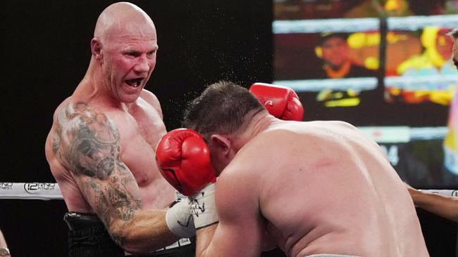 Hall eventually did end up back in the ring post-retirement, fighting ex-rugby league star Paul Gallen in their ‘Code War’ match. Picture: AAP Image/Michael Dodge