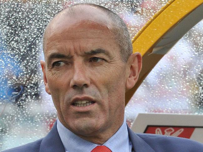 Coach Paul Le Guen of Oman applauds during the first round Asian Cup football match between South Korea and Oman in Canberra on January 10, 2015. AFP PHOTO / MARK GRAHAM --- IMAGE RESTRICTED TO EDITORIAL USE - STRICTLY NO COMMERICAL USE --