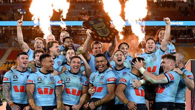 BRISBANE, AUSTRALIA - JULY 17: The New South Wales Blues celebrate victory after game three of the 2024 Men's State of Origin series between Queensland Maroons and New South Wales Blues at Suncorp Stadium on July 17, 2024 in Brisbane, Australia. (Photo by Bradley Kanaris/Getty Images)