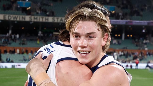 ADELAIDE, AUSTRALIA - SEPTEMBER 05: Jack Henry (left) and Tanner Bruhn of the Cats celebrate during the 2024 AFL Second Qualifying Final match between the Port Adelaide Power and the Geelong Cats at Adelaide Oval on September 05, 2024 in Adelaide, Australia. (Photo by Michael Willson/AFL Photos via Getty Images)