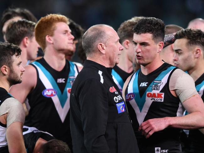 Ken Hinkley with players at the three quarter time during the Round 23 AFL match between the Port Adelaide Power and the Fremantle Dockers at Adelaide Oval. Picture: AAP Image/David Mariuz