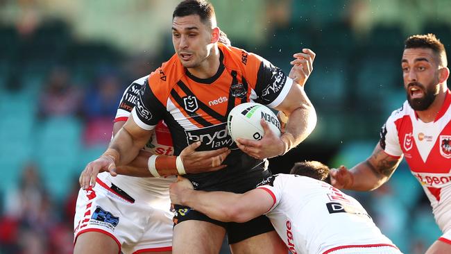 Ryan Matterson of the Tigers is tackled by the Dragons defence during the Round 24 NRL match between the St George Illawarra Dragons and the Wests Tigers at the SCG in Sydney, Sunday, September 1, 2019. (AAP Image/Brendon Thorne) NO ARCHIVING, EDITORIAL USE ONLY