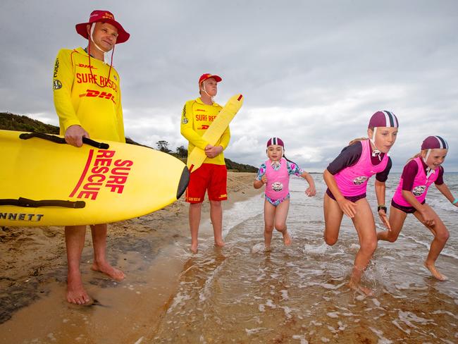 WARNING HOLD FOR MONDAY VICTORIANS are being urged to be on high alert this summer after the deadliest spate of drownings on record. Life Saving VictoriaÕs latest drowning report shows 40 people died at beaches, pools and other waterways over the last year, including 23 deaths in a horror summer. Nippers L t R Claire, 8, Zahli, 10, and Lily, 7, with Surf Life Savers L to R Colin Williams and Lucas Waters. Picture: Mark Stewart