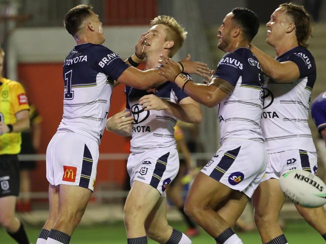 Scott Drinkwater (L) celebrates scoring a try during the round five NRL match between the New Zealand Warriors and the North Queensland Cowboys at Moreton Daily Stadium. Picture: Glenn Hunt/Getty Images