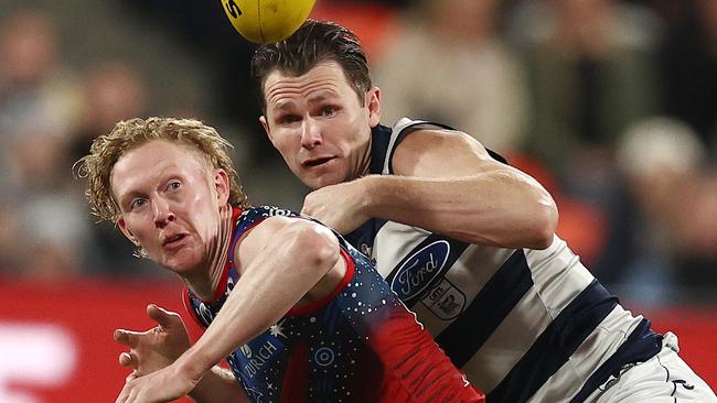 MELBOURNE. 07/07/2022. AFL Round 17. Geelong vs. Melbourne at GMHBA Stadium, Geelong. Clayton Oliver of the Demons and Patrick Dangerfield of the Cats during the 2nd qtr. . Photo by Michael Klein