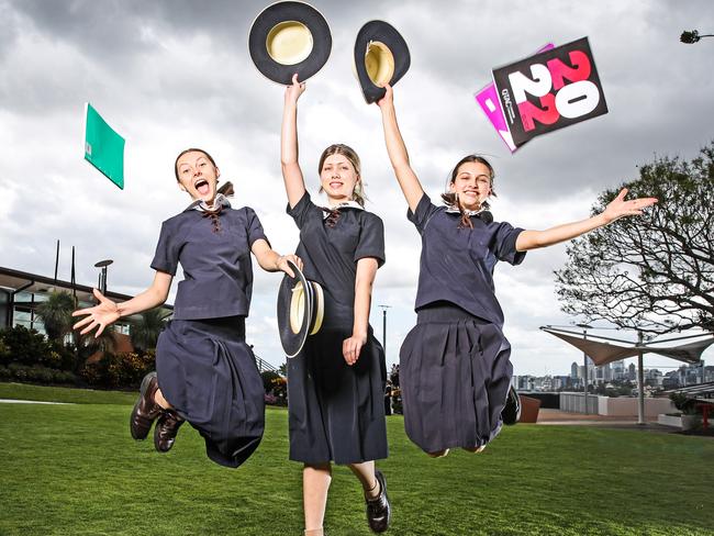 Grade 12 students from St Margaret's Anglican Girls School, Paige Bastian, 17, Estella Caro, 17 and Zara Campbell, 17 are happy that exams are over for the year.  Picture: Zak Simmonds