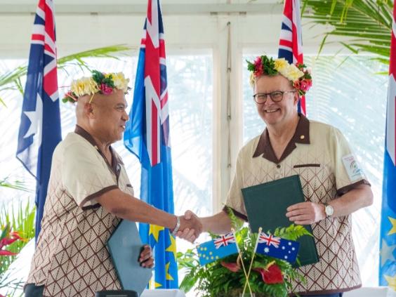 Australian Prime Minister Anthony Albanese shakes hands with Prime Minister of Tuvalu Feleti Teo after signing agreements for the Australia-Tuvalu Falepili Union to come into force at the 53rd Pacific Islands Forum Leaders Meeting in Nuku'alofa, Tonga, Wednesday, August 28, 2024. Leaders from Pacific Island nations are gathering in Tonga for the 53rd Pacific Islands Forum Leaders Meeting. Picture: X / PMO