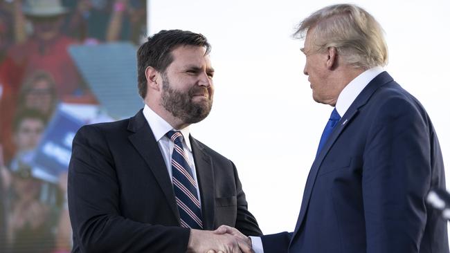 J.D. Vance greets Donald Trump at a rally in Delaware, Ohio, on April 23. Picture: AFP