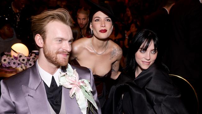 Finneas (left), Halsey (centre), and Billie Eilish inside the 2022 Grammy Awards. Picture: Emma McIntyre/Getty Images for The Recording Academy.