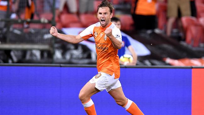 Brett Holman of the Roar celebrates scoring the winner over the Glory.