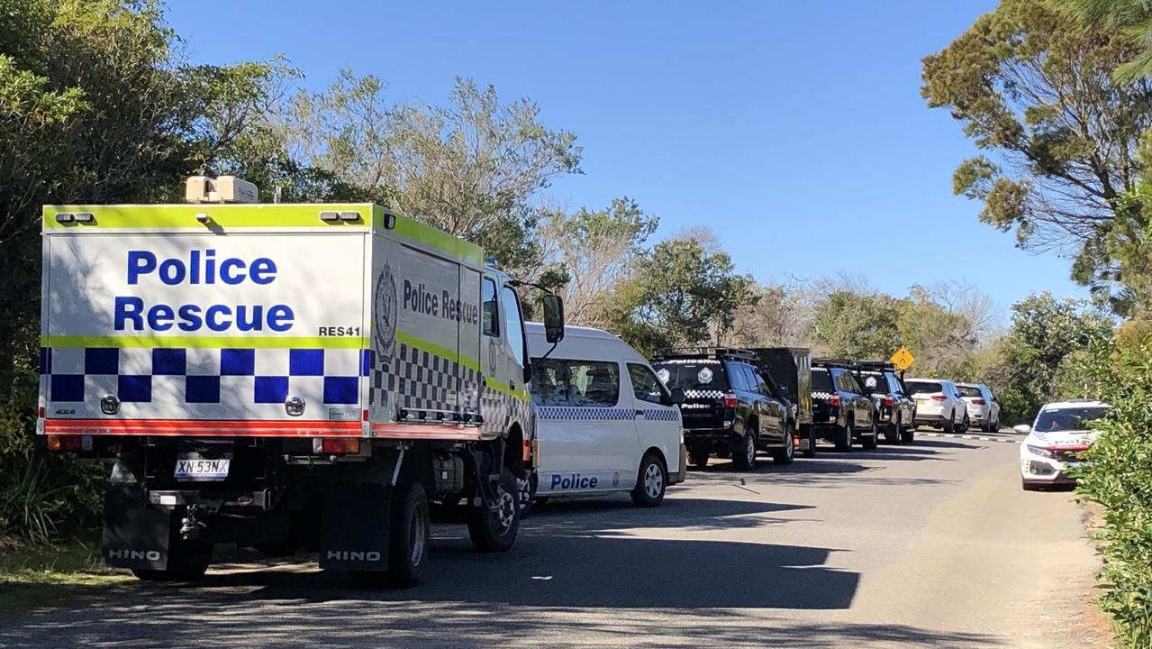 Police vehicles at the Blue Fish Point search location today. Picture: Jim O’Rourke