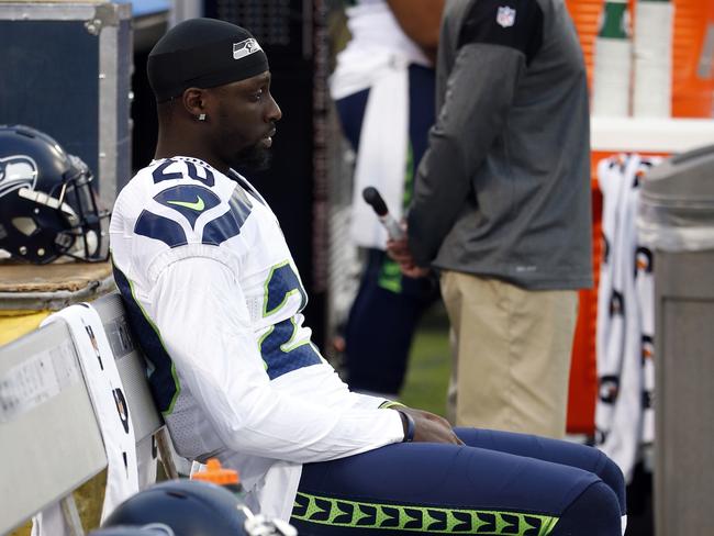 Seattle Seahawks cornerback Jeremy Lane chose to sit during the anthem in a preseason game, showing solidarity with Kaepernick.