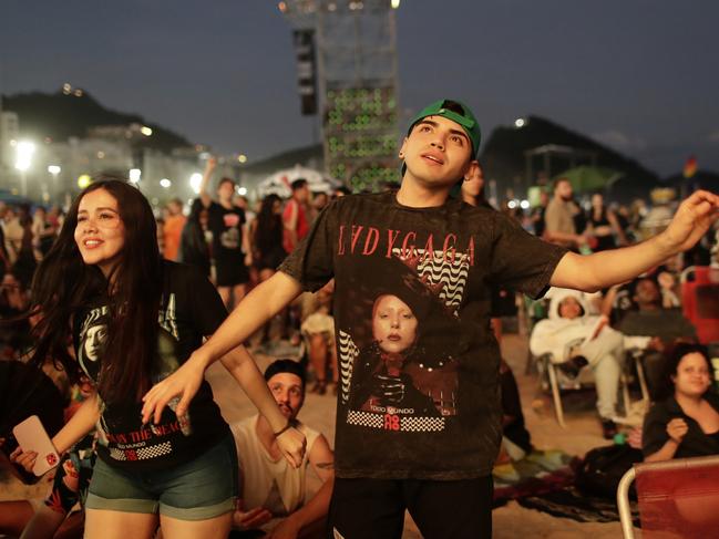 Fans wait for the start of Lady Gaga's free concert on Copacabana beach in Rio de Janeiro. Police said some had been recruited online in a bomb plot. Picture: AP Photo/Bruna Prado