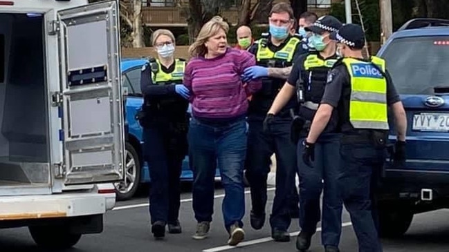 Anti-masker Mandy Crerar as she was being arrested in Frankston.