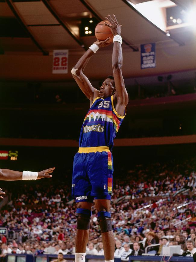 Mutombo shoots a jumper in 1991 in the iconic Nuggets jersey. (Photo by Nathaniel S. Butler/NBAE via Getty Images)