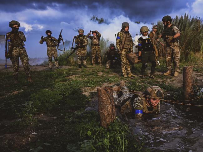 The women of the 128th Carpathian Mountain Assault Brigade recently took part in training in the Zaporizhzhia region, with the gruelling exercises caught on film. Picture: Ercin Erturk/Anadolu Agency via Getty Images