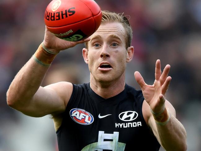 Nick Graham of the Blues catches the ball during the Round 8 AFL match between the Carlton Blues and the Essendon Bombers at the MCG in Melbourne, Saturday, May 12, 2018. (AAP Image/Joe Castro) NO ARCHIVING, EDITORIAL USE ONLY