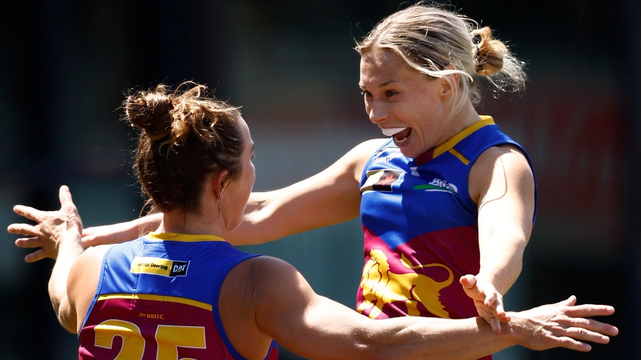 MELBOURNE, AUSTRALIA - NOVEMBER 10: Cathy Svarc (left) and Charlotte Mullins of the Lions celebrate during the 2024 AFLW Second Qualifying Final match between the Hawthorn Hawks and the Brisbane Lions at IKON Park on November 10, 2024 in Melbourne, Australia. (Photo by Michael Willson/AFL Photos via Getty Images)