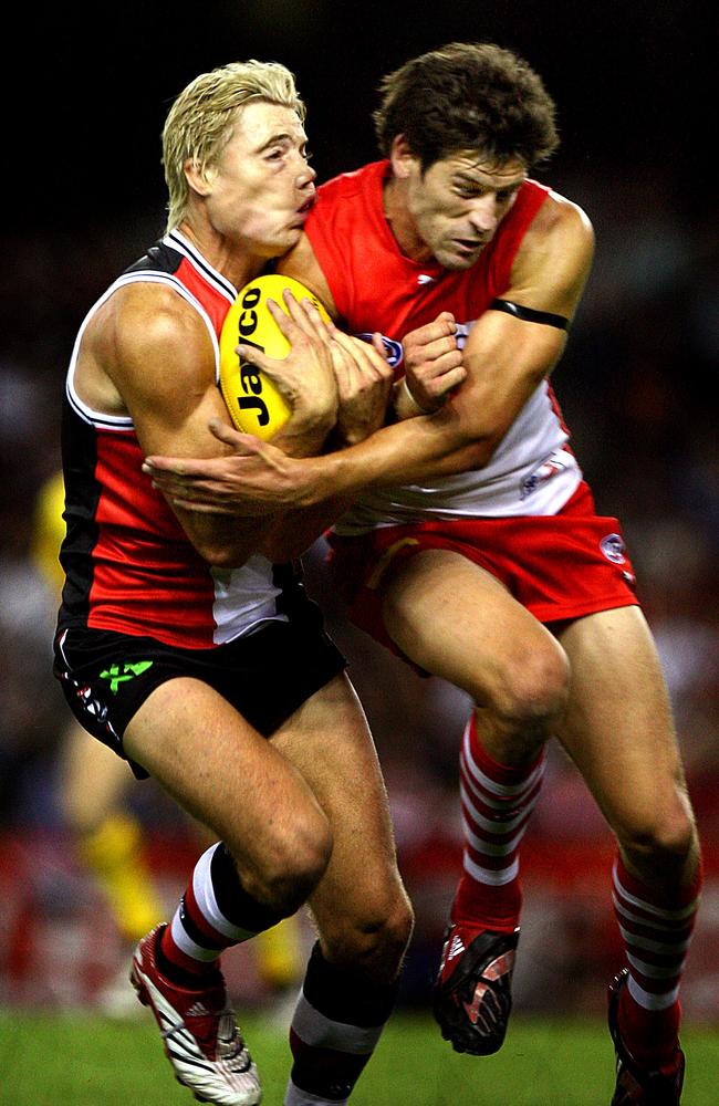 2008: St Kilda’s Clinton Jones manages to hold a chest mark despite the massive impact of a bump from Sydney’s Martin Mattner. The Saints also held on, winning the Round 1 clash by two points. Picture: Wayne Ludbey