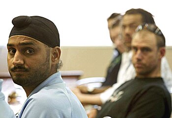 Bitter fued ... Harbhajan and Symonds after SCG battle. AP