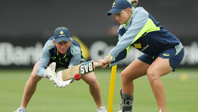 Injured captain Alyssa Healy has been wearing a moon boot to nurse her injured foot. (Photo by Mark Metcalfe/Getty Images)