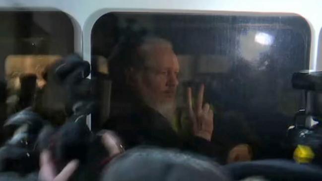 WikiLeaks founder Julian Assange is driven by British Police to Westminster Magistrates Court in London on April 11, 2019.