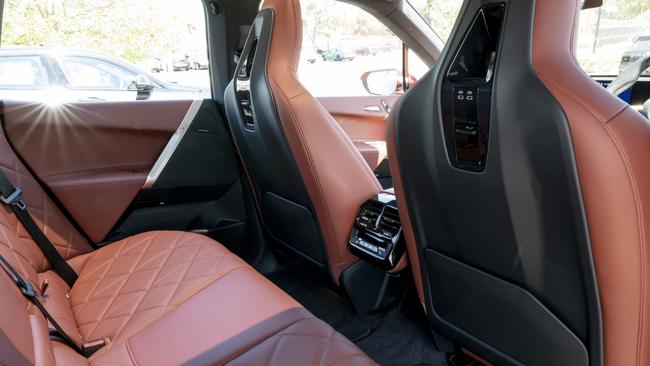 Rear seat space in BMW iX.