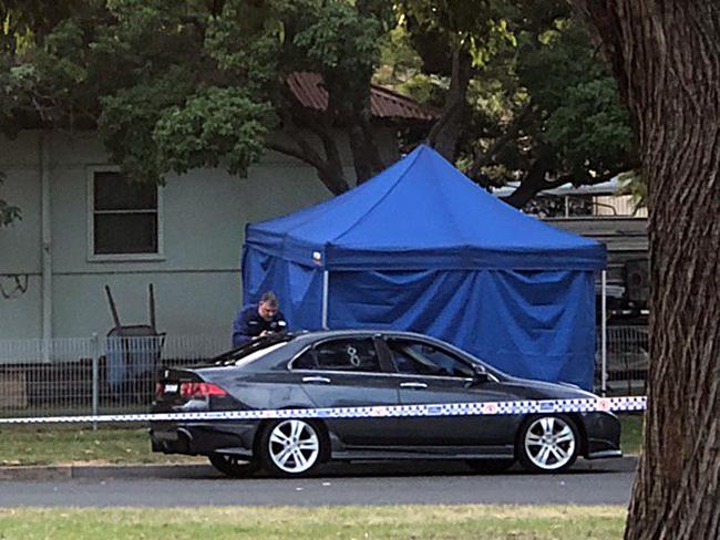 Police on scene at Unanderra after Nathan Costello was shot dead last year. Picture: 9 News Illawarra.