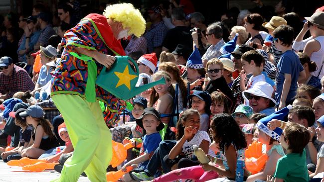 Children get their own back on a clown with a watering can to the delight of the kids at the Christmas Pageant. Picture: File