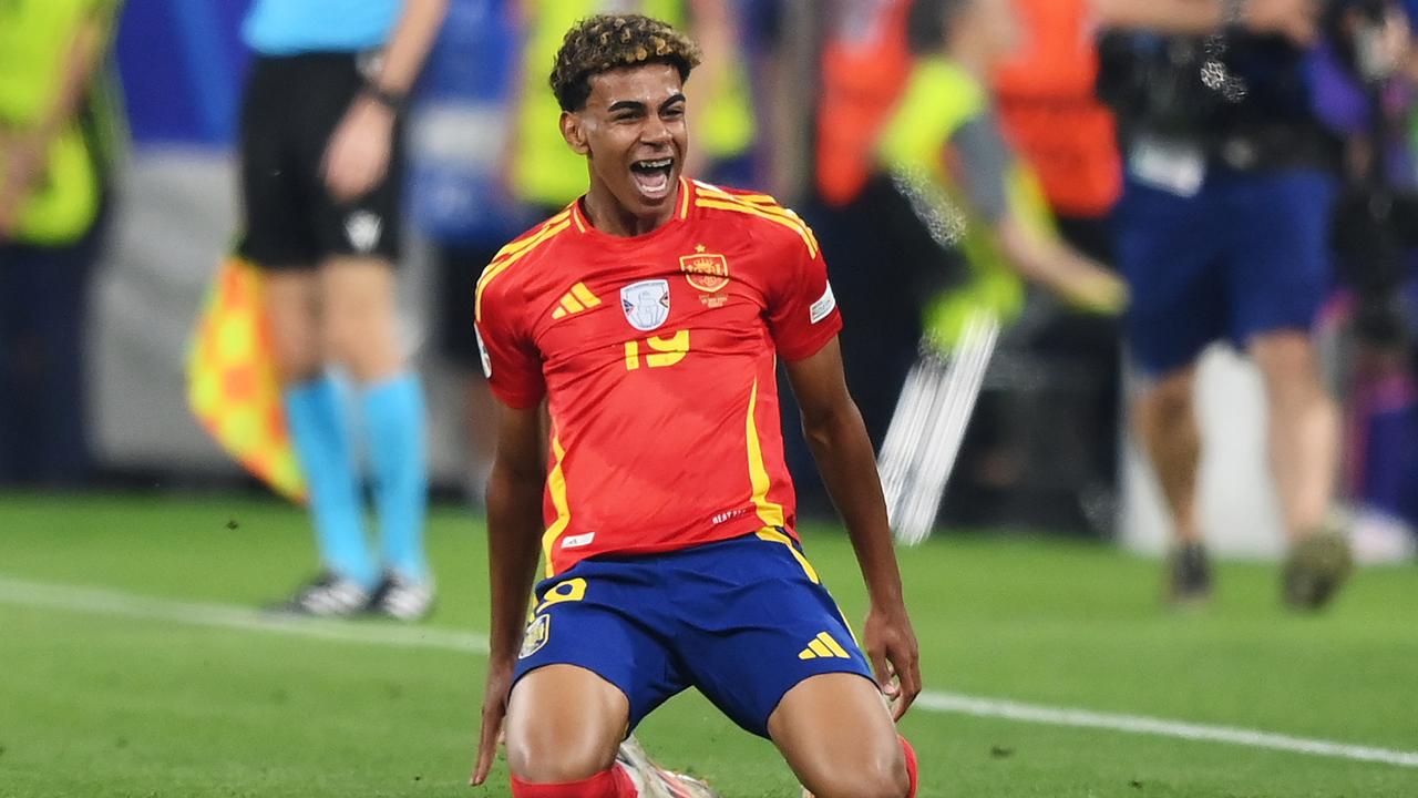 Lamine Yamal of Spain celebrates his historic moment. Photo by Justin Setterfield/Getty Images.