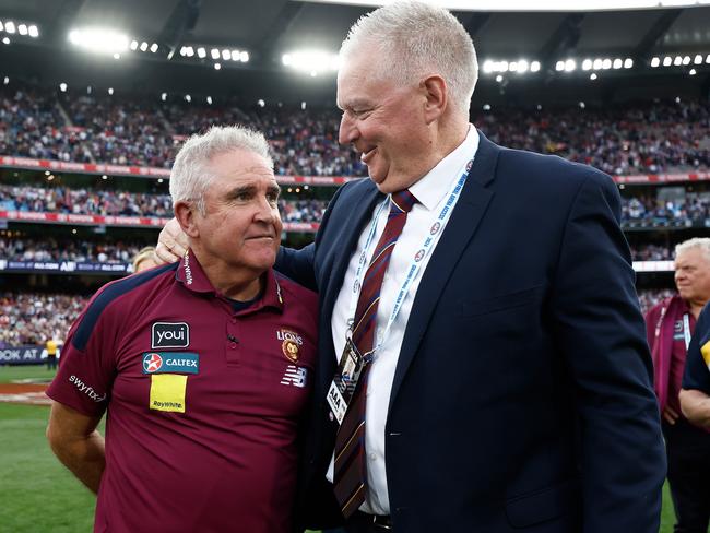 Greg Swann (right) and Brisbane coach Chris Fagan celebrate after the Lions’ win in last season’s AFL grand final. Picture: Michael Willson/AFL Photos via Getty Images