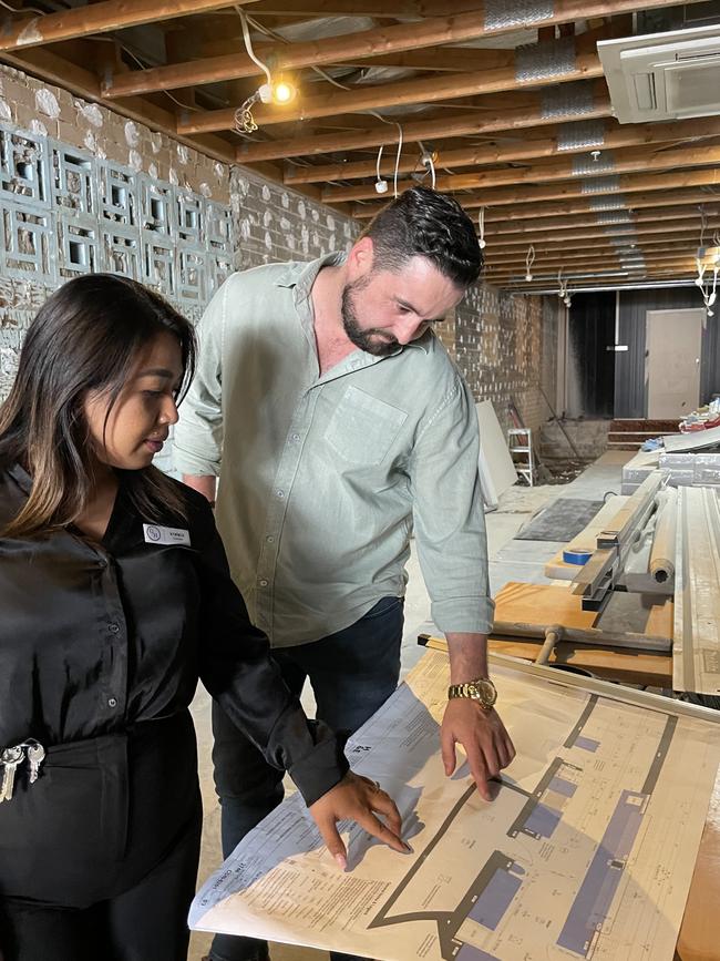 Guildford Hotel licensee Kimmie Mel and Nelson Meers marketing manager Chris Farnon inspect plans in the bistro area.