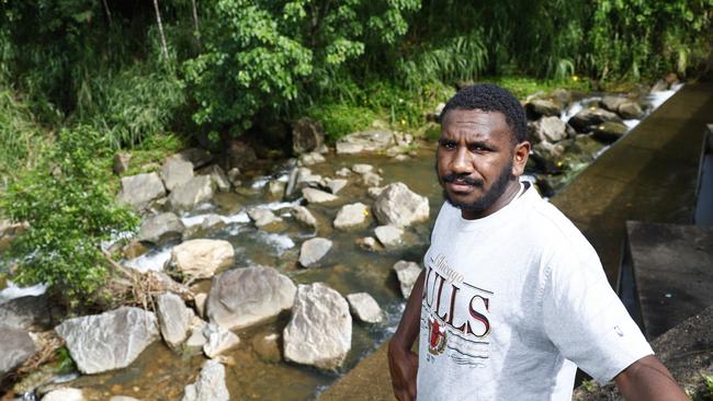 Fourteen-year-old Michael Misi didn't hesitate to help a young girl who found herself in trouble in a swollen Gordon Creek at Woree on Friday afternoon, jumping into the fast-flowing, neck-deep torrent and pulling the girl to safety before she was swept away. Photo: Brendan Radke