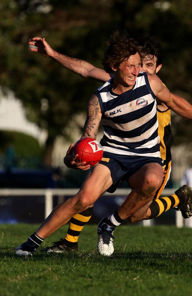 Todd Finco gathers the ball. Picture: Mark Dadswell