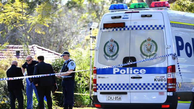 NSW Police stand outside the Normanhurst home where John Edwards killed himself after shooting dead his children Jack and Jennifer. Picture: AAP Image/David Moir