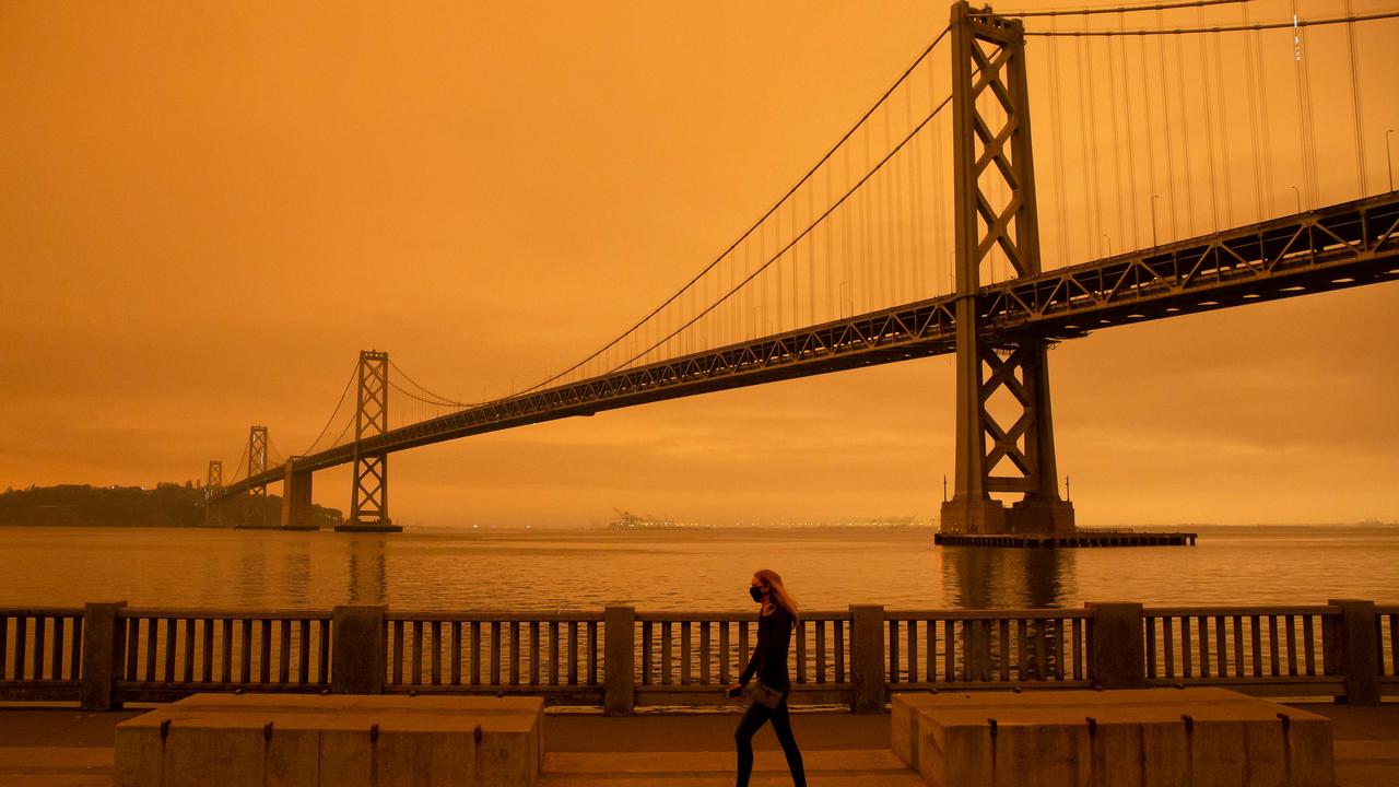 A woman walking in front of the Golden Gate Bridge. Picture: Brittany Hosea-Small/AFP